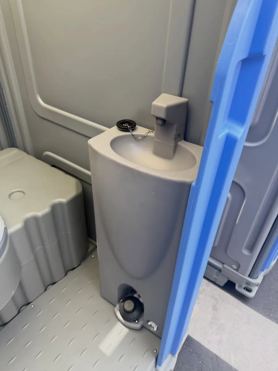Photo: Flush and sink inside, no hookups